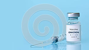 Bottle of Covid-19 vaccine to immunize from the Omicron Variant Coronavirus. The concept of medicine, healthcare and science.Copy photo