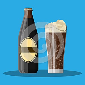 Bottle of dark stout beer with glass