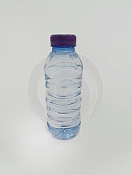 Bottle drinkwater from the side angel with studios lighting and white background photo