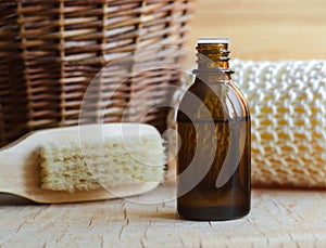 A bottle of essential oil and toiletries