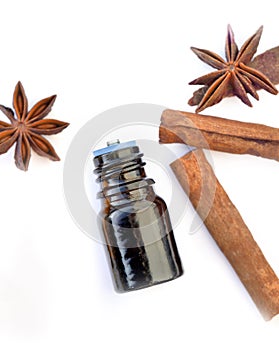 Bottle of essential oilwith  cinnamon and anise