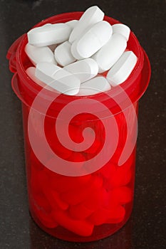 Bottle filled with calcium tablets