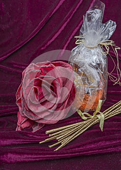 Bottle and flower as a gift