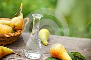 Bottle of fruit brandy and pear