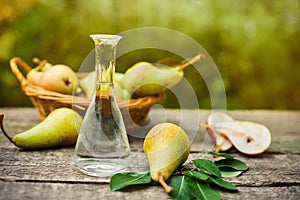Bottle of fruit brandy and pear