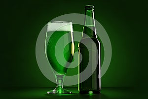 The bottle and the glass of beer on St. Patrick`s Day
