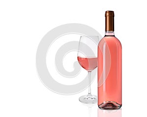 Bottle and glass of delicious rose wine on white background