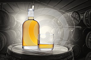 A bottle and glass of glowing amber whisky set on top of an old barrel, in a barrel warehouse, back lit with light shinning