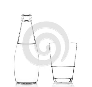 A bottle and a glass of pure fresh water isolated