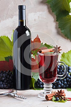 Bottle glass of red mulled wine mockup for your logotype