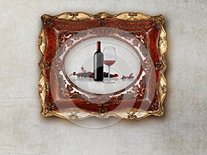 Bottle and glass wine in old picture frame on marble background