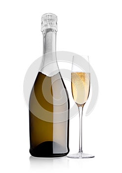 Bottle and glass of yellow champagne on white