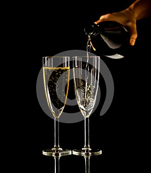 Bottle and glasses of Champagne toasting for New year Romantic Celebration and Special moments
