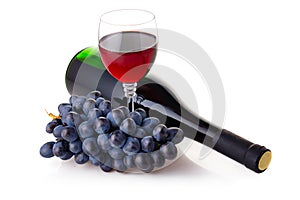 Bottle and goblet of red wine with grapes