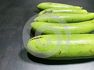 bottle gourd, Lagenaria siceraria isolated on black background.