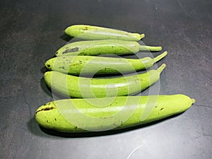 bottle gourd, Lagenaria siceraria isolated on black background.