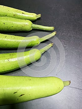 bottle gourd, Lagenaria siceraria isolated on black background.