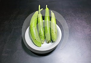 bottle gourd, Lagenaria siceraria isolated on black background.