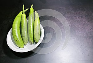 bottle gourd, Lagenaria siceraria isolated on black background.