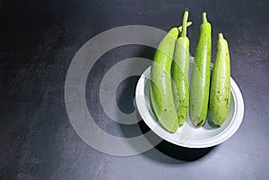 bottle gourd, Lagenaria siceraria isolated on black background.