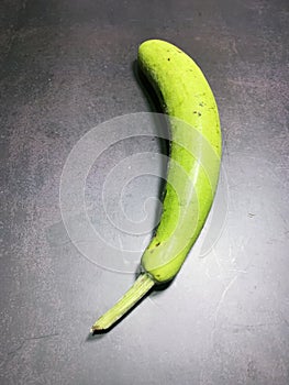 bottle gourd, Lagenaria siceraria isolated on black background.