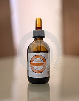 Bottle with iodine liquid for first aid use
