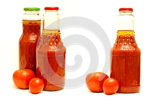 Bottle of ketchup and tomatoes