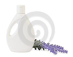 Bottle of liquid soap and lavender flower on white