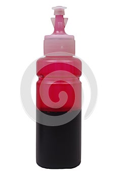 Bottle of magenta ink for inkjet printer isolated on white background