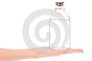 Bottle with medical alcohol disinfection in hand