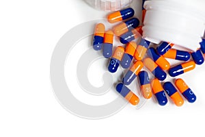 Bottle of medical pills or capsules isolated over white