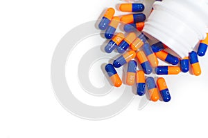 Bottle of medical pills or capsules isolated over white