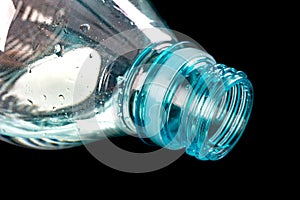 Bottle neck and plastic cap. Water storage container.