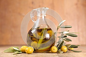 Bottle of olive oil and herbs