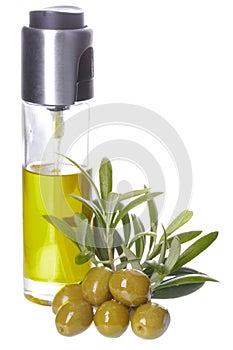 Bottle of olive oil, olives and leaves