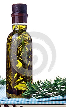 Bottle olive oil with rosemary