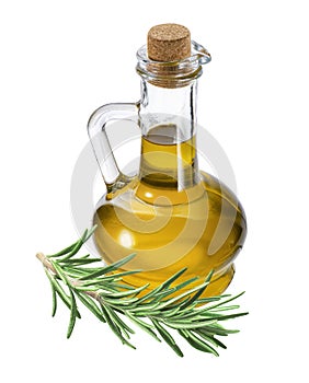 Bottle of olive oil and rosemary isolated on white background