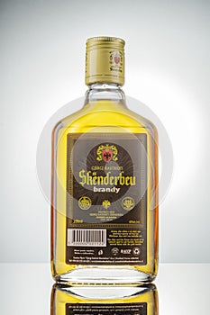 Bottle of original albanian brandy Skenderbeu on gradient background.