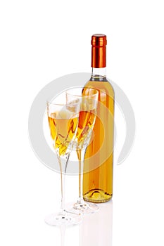 Bottle of passito wine with wine glasses