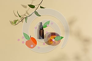 Bottle of peach essential oil flatlay concept with leaves and littles flowers cut from paper and