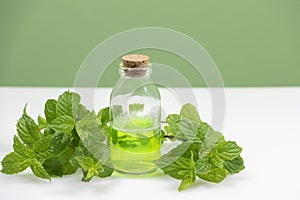 A bottle with peppermint essential oil