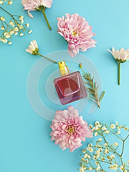 Bottle perfume flower elegance scent romance composition fashion on a colored background floral