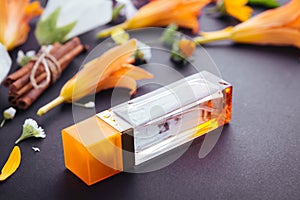 Bottle of perfume with ingredients