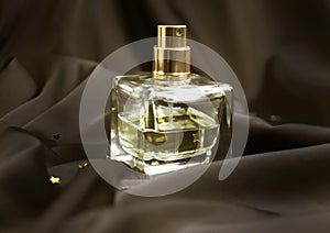 Bottle perfume silk fabric, background aromatherapy