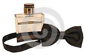 Bottle of perfume and a tuxedo bow