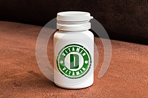 Bottle of pills with vitamin D