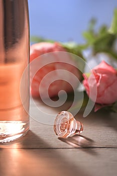 Bottle Of Pink Rose Wine and Spring Flowers