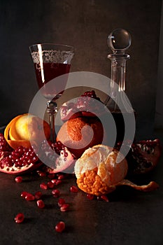 Still life with wine and fresh fruits