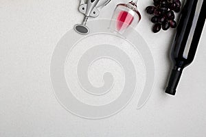 Bottle of red wine with glasses on white background top view mock-up