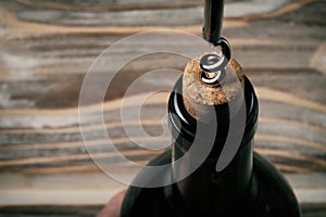 Bottle of red wine bottle opener corkscrew